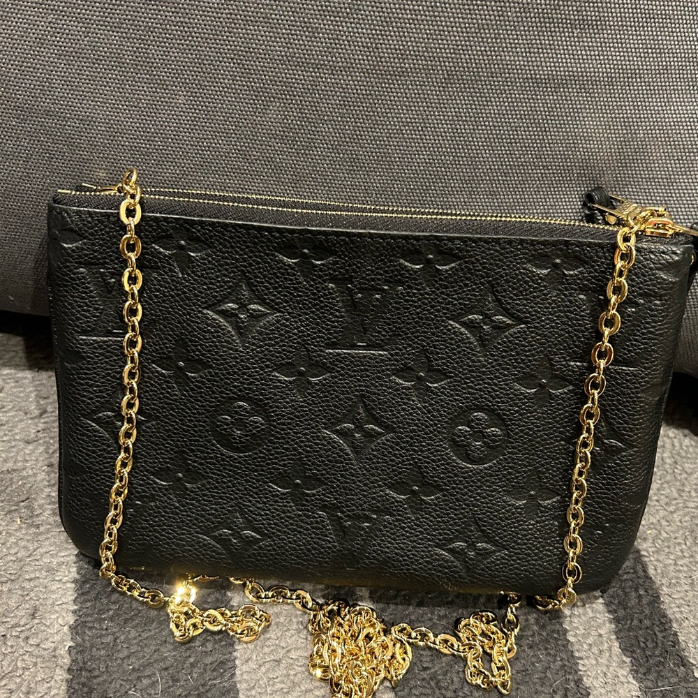 Authentic Louis Vuitton Black Empreinte Pochette Crossbody bag